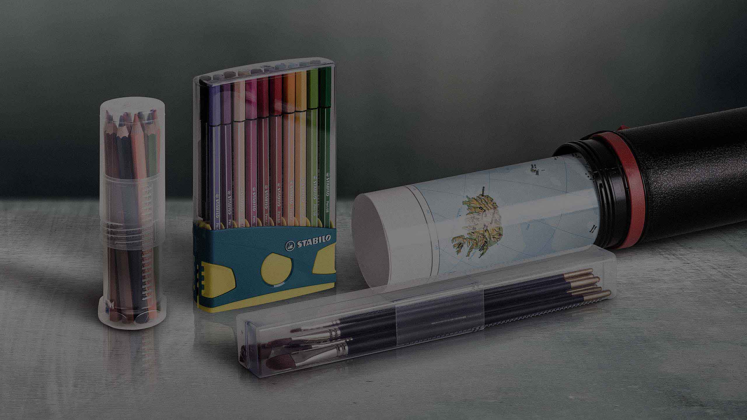 A selection of plastic packaging for stationery and art supplies.